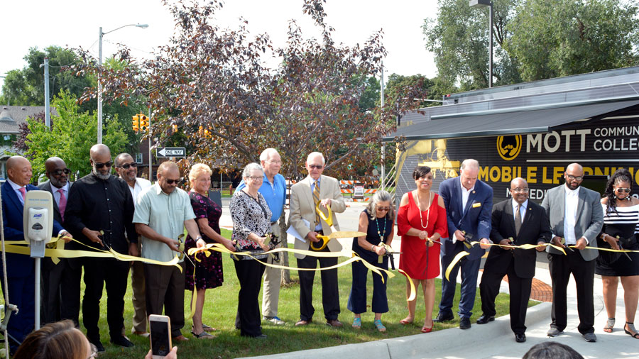 Local and State dignitaries along with MCC Members and Drs. Paul & Theresa Lafia participate in the ribbon cutting for the new MCC mobile training unit, which will take the college classroom into the community and beyond.  The mobile unit was provided in part through a significant contribution by Drs. Paul & Theresa Lafia.