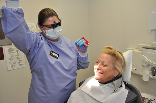 Student getting x-rays from Dental Hygiene student