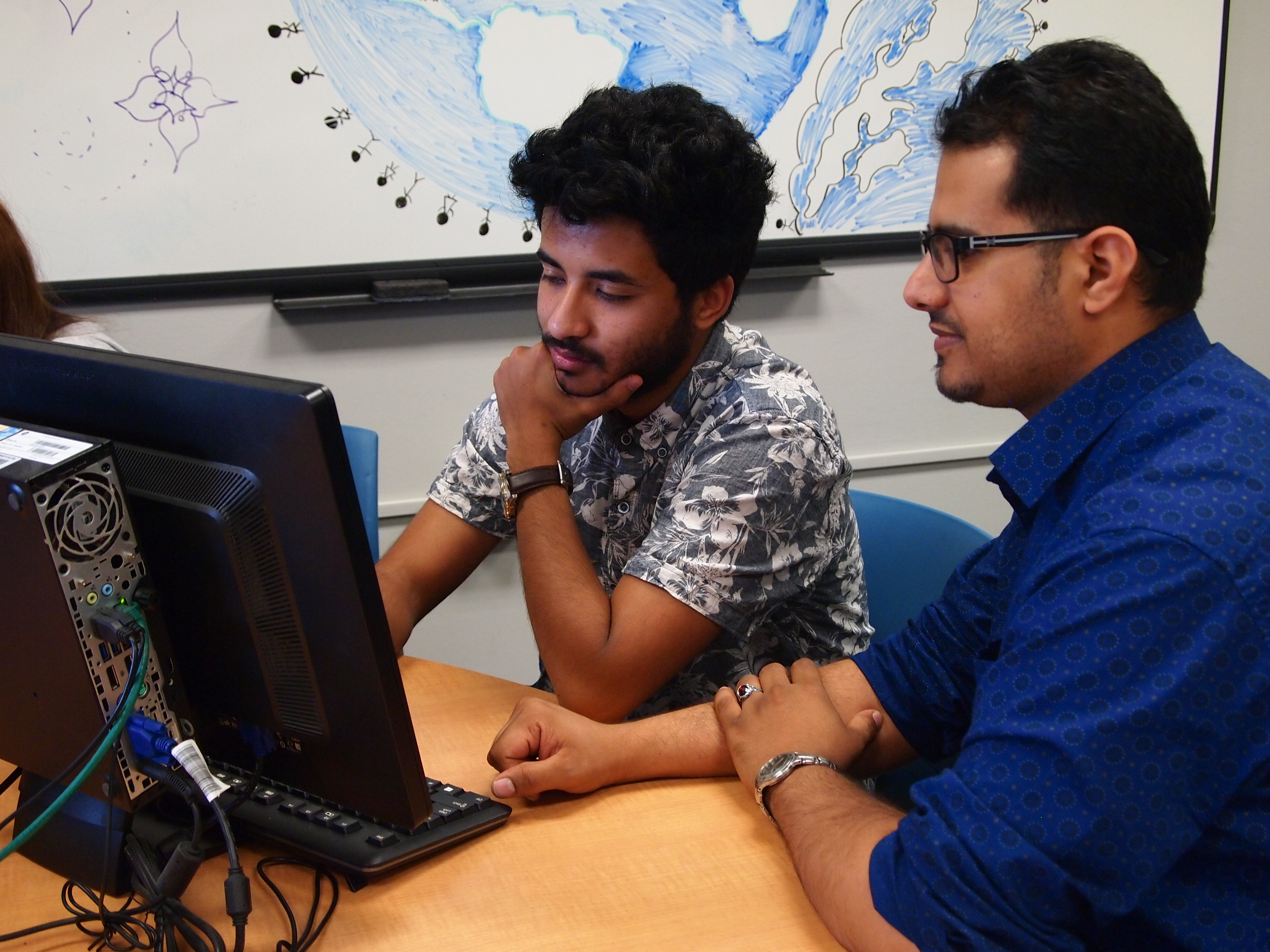 2 students in World Culture and Language Lab